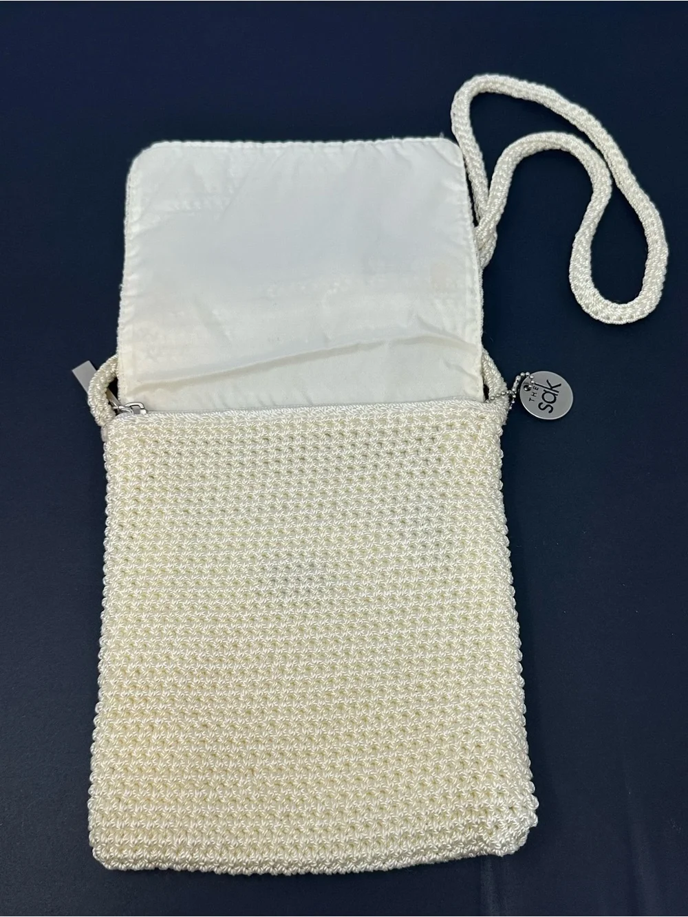 The Sak Crossbody Bag Ivory Cream Crochet With Flap And Zip Closure A5